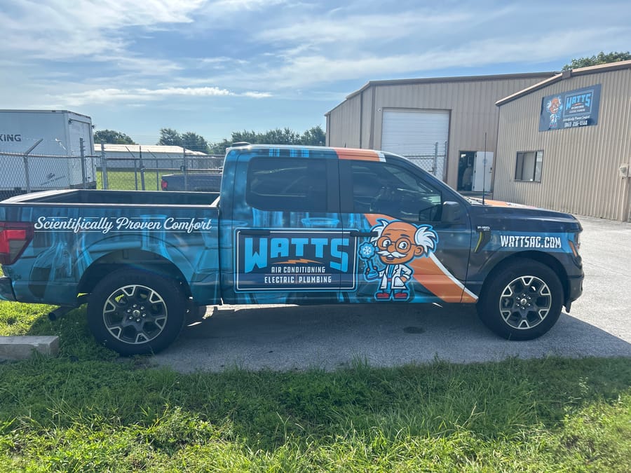 Watts truck sitting in driveway.